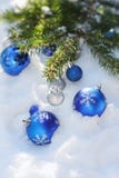 Decorative Christmas balls on the snow and brunch of Christmas tree outdoor royalty free stock images Decorative Christmas balls on the snow and brunch of Christmas tree outdoor royalty free stock images