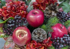 Decorative Christmas composition of apples, berries and pine cones royalty free stock images Decorative Christmas composition of apples, berries and pine cones royalty free stock images