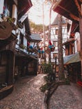 Decorative gnomes hanging in the middel of paved path royalty free stock photography Decorative gnomes hanging in the middel of paved path royalty free stock photography