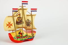 Decorative wooden toys boat, dutch boot-boat on white background. Place for text. Selective focus. Horizontal image royalty free stock images Decorative wooden toys boat, dutch boot-boat on white background. Place for text. Selective focus. Horizontal image royalty free stock images