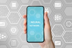 Deep neural network concept. Hand holding modern bezel free smart phone in front of neutral background with icons Stock Photo Deep neural network concept. Hand holding modern bezel free smart phone in front of neutral background with icons Stock Photo