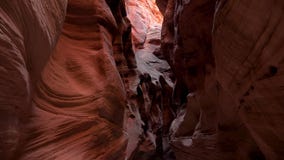 Fantastic Deep Slot Canyon With Curved And Smooth Orange Red Stone Rock Walls