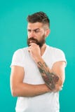 Deep thoughts. Man serious face not confident. Have some doubts. Hipster bearded face not sure in something. Doubtful stock images Deep thoughts. Man serious face not confident. Have some doubts. Hipster bearded face not sure in something. Doubtful stock images
