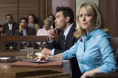 Defense Lawyer With Client In Court Stock Photo Defense Lawyer With Client In Court Stock Photo