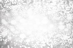 Defocused Bokeh light, shimmering blur spot lights on silver a royalty free stock photography Defocused Bokeh light, shimmering blur spot lights on silver a royalty free stock photography