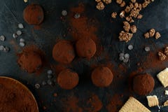 Delicious Chocolate Balls - Served On A Black Background With Coffee Royalty Free Stock Photos