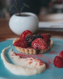 Delicious chocolate tartine with red fruits and creme royalty free stock images Delicious chocolate tartine with red fruits and creme royalty free stock images