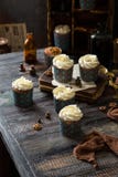 Delicious Homemade Carrot Cupcakes In Blue Paper Cups With White Beautiful Icing Stock Photo Delicious Homemade Carrot Cupcakes In Blue Paper Cups With White Beautiful Icing Stock Photo