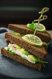 Delicious sandwiches dark bread on skewers with Royalty Free Stock Photo Delicious sandwiches dark bread on skewers with Royalty Free Stock Photo