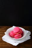 Delicious strawberry macaroon in a plate. Dessert Royalty Free Stock Photography Delicious strawberry macaroon in a plate. Dessert Royalty Free Stock Photography