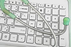 Den gröna stetoskopet eller doktorsinstrumentet eller utrustning för lyssnar H royaltyfria bilder Den gröna stetoskopet eller doktorsinstrumentet eller utrustning för lyssnar H royaltyfria bilder