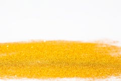 Den guld- brusanden blänker bakgrund fotografering för bildbyråer Den guld- brusanden blänker bakgrund fotografering för bildbyråer