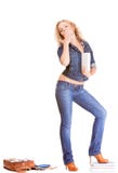 Denim fashion. Full length student girl in blue jeans bag books Stock Images Denim fashion. Full length student girl in blue jeans bag books Stock Images