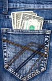 Denim Jeans With Money In Back Pocket Royalty Free Stock Images