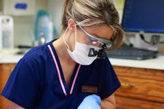 Dental Hygienist At Work