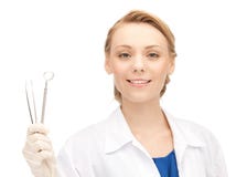 Dentista femminile attraente con gli strumenti immagine stock libera da diritti Dentista femminile attraente con gli strumenti immagine stock libera da diritti