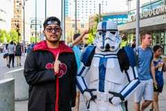 Denver, Colorado, USA - July 1, 2017: Two people in costume for Denver Comic Con stock photo Denver, Colorado, USA - July 1, 2017: Two people in costume for Denver Comic Con stock photo