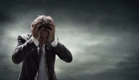 Depressed Businessman With Grunge Cloudscape stock photos Depressed Businessman With Grunge Cloudscape stock photos