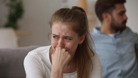 Depressed crying young woman wife upset about family fights