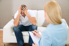Depressed Patient In Front Of Psychiatrist Royalty Free Stock Image Depressed Patient In Front Of Psychiatrist Royalty Free Stock Image