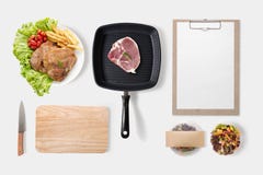 Design concept of mockup bbq steak set and salad set on royalty free stock photography Design concept of mockup bbq steak set and salad set on royalty free stock photography
