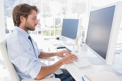 Designer Sitting At His Desk And Working Royalty Free Stock Photos Designer Sitting At His Desk And Working Royalty Free Stock Photos