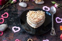 Dessert for Valentine`s day celebration on black plate. royalty free stock image Dessert for Valentine`s day celebration on black plate. royalty free stock image