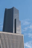 Detail of the Columbia Center tower after another building and a plane in the background in Seattle, Washington, USA. stock photos Detail of the Columbia Center tower after another building and a plane in the background in Seattle, Washington, USA. stock photos