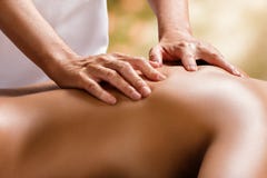 Detail of therapist hands on female back. Stock Photo Detail of therapist hands on female back. Stock Photo