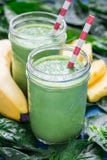 Detox green smoothie with spinach, pineapple, banana, yogurt stock image Detox green smoothie with spinach, pineapple, banana, yogurt stock image