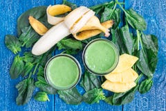 Detox green smoothie with spinach, pineapple, banana and yogurt, top view royalty free stock photos Detox green smoothie with spinach, pineapple, banana and yogurt, top view royalty free stock photos