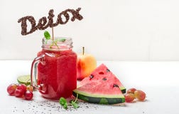 Detox watermelon smoothies and ingredients. The word detox from chia seeds royalty free stock photo Detox watermelon smoothies and ingredients. The word detox from chia seeds royalty free stock photo