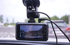 A device for monitoring the situation on the road. Installed in the car. Details and close-up stock photos A device for monitoring the situation on the road. Installed in the car. Details and close-up stock photos