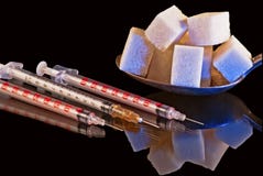 Diabetes: A Syringe And Sugar Royalty Free Stock Image