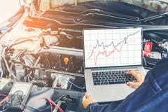 Diagnostic machine tools ready to be used with car royalty free stock photo Diagnostic machine tools ready to be used with car royalty free stock photo