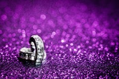 Diamond in purple water drops