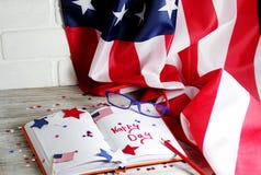 Diary with glasses open on the date of July 4, happy independence day, patriotism and memory of veterans royalty free stock photos Diary with glasses open on the date of July 4, happy independence day, patriotism and memory of veterans royalty free stock photos