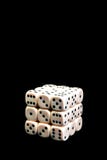 Dice in the form of a cube on a black background, isolate royalty free stock images Dice in the form of a cube on a black background, isolate royalty free stock images