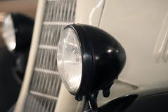 Dichte omhooggaand van de koplamp retro auto stock foto's Dichte omhooggaand van de koplamp retro auto stock foto's