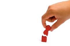 Die Hand sammelt die defekte menschliche Figur Psychologisches assista lizenzfreies stockfoto Die Hand sammelt die defekte menschliche Figur Psychologisches assista lizenzfreies stockfoto