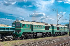 Diesel locomotive with cargo train royalty free stock photo Diesel locomotive with cargo train royalty free stock photo