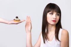 Dieting woman refusing cake royalty free stock photos Dieting woman refusing cake royalty free stock photos
