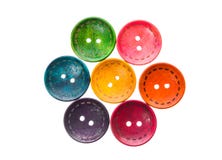 Different color round circular shaped sewing buttons in a flower Royalty Free Stock Images Different color round circular shaped sewing buttons in a flower Royalty Free Stock Images