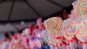 Different colorful lollipops on the market stock photos Different colorful lollipops on the market stock photos