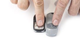 Different garage wireless remote controls for opening and closing. Duplicating cloning programming. stock images Different garage wireless remote controls for opening and closing. Duplicating cloning programming. stock images