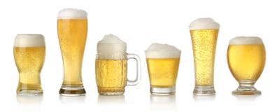 Different glasses of cold lager beer