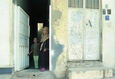 Different muslim people handles personal affairs after conflict with military during curfews stock image Different muslim people handles personal affairs after conflict with military during curfews stock image