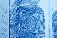 Digital ink fingerprint over a textured paper. Security control royalty free stock photos Digital ink fingerprint over a textured paper. Security control royalty free stock photos