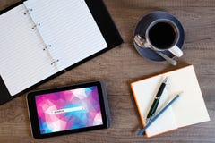 Digital tablet computer with note paper and cup of coffee Stock Photos Digital tablet computer with note paper and cup of coffee Stock Photos