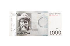 Dinero de Kirguistán en un fondo blanco imagen de archivo Dinero de Kirguistán en un fondo blanco imagen de archivo